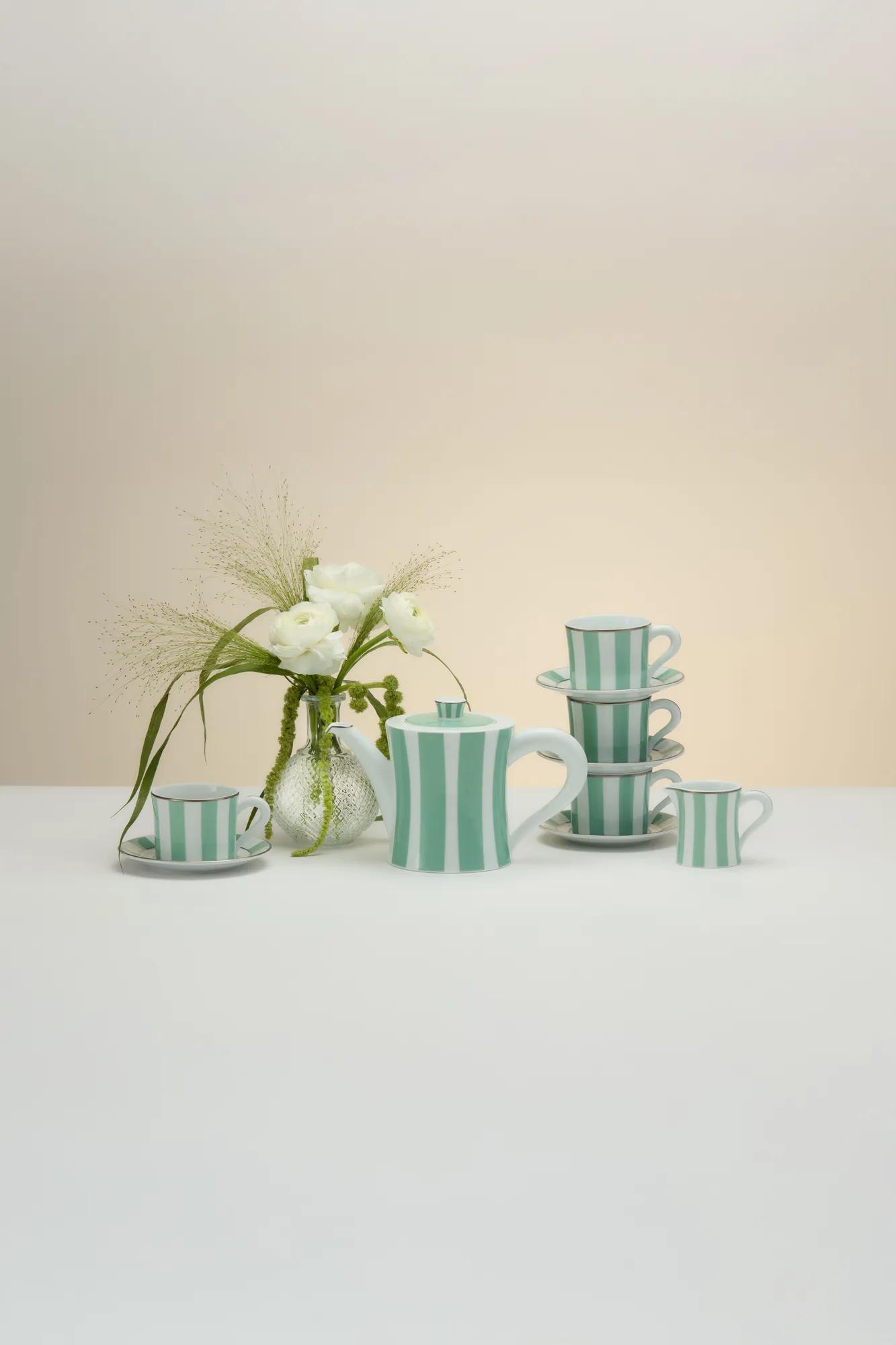 A Claridge’s Afternoon Tea retail display featuring elegantly packaged teas, pastries, and gift items arranged with refined seasonal styling.