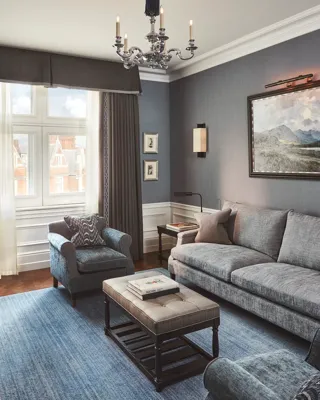 A view inside the Coburg Suite at Claridge’s, showcasing elegant contemporary décor, refined furnishings, and a serene, luxurious atmosphere.