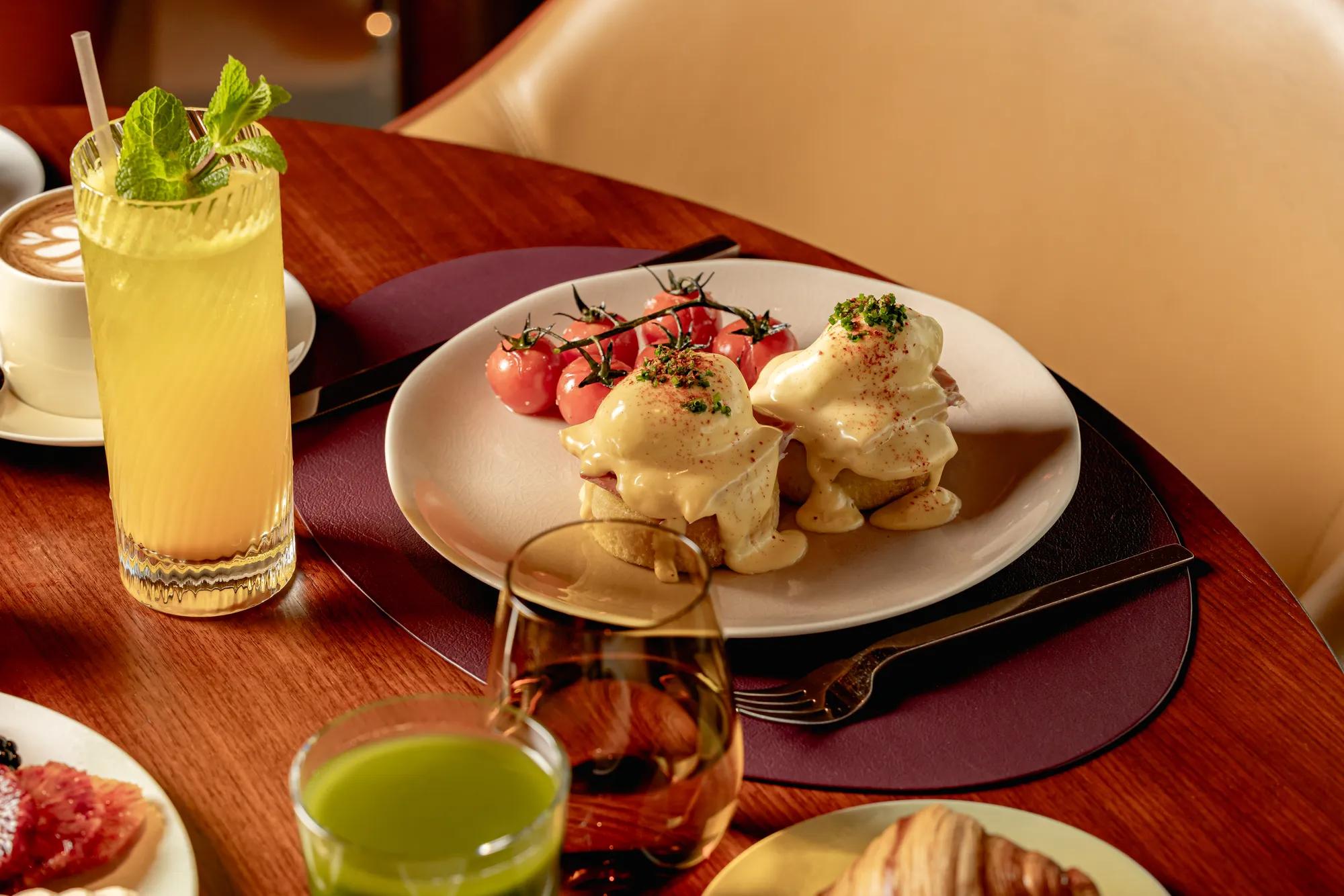 A beautifully arranged breakfast spread at ABC Kitchens, featuring fresh dishes presented with modern, elegant styling.