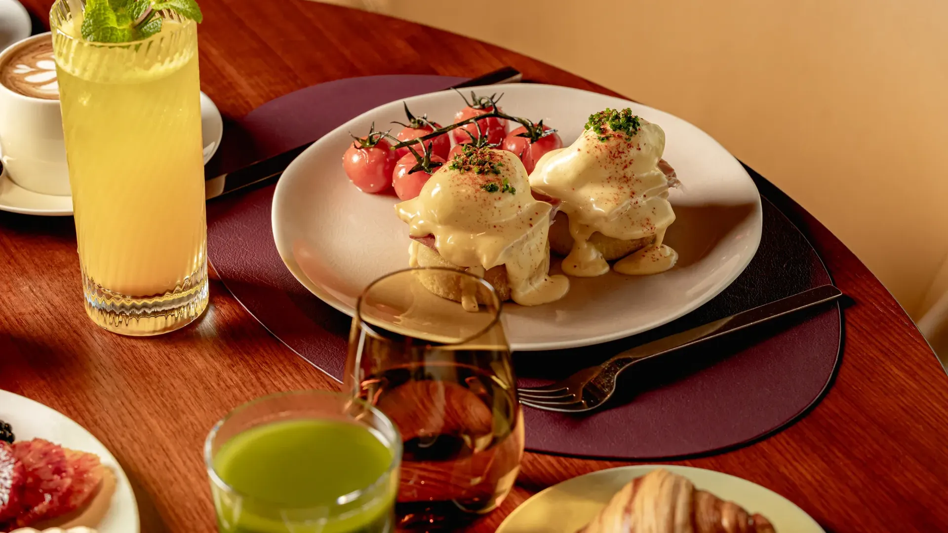 A beautifully arranged breakfast spread at ABC Kitchens, featuring fresh dishes presented with modern, elegant styling.