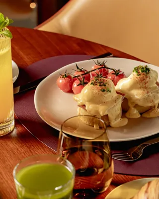 A beautifully arranged breakfast spread at ABC Kitchens, featuring fresh dishes presented with modern, elegant styling.