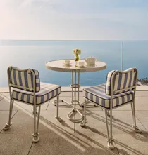 A Grand Sea View Studio at Maybourne Riviera, featuring elegant contemporary décor and expansive windows framing sweeping views of the Mediterranean coastline.
