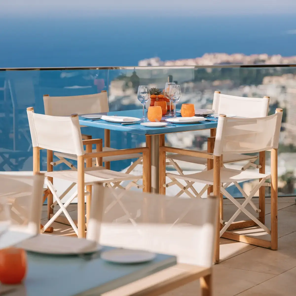 The outdoor pool at Maybourne Riviera, overlooking the Mediterranean, with sleek contemporary design and serene coastal views.