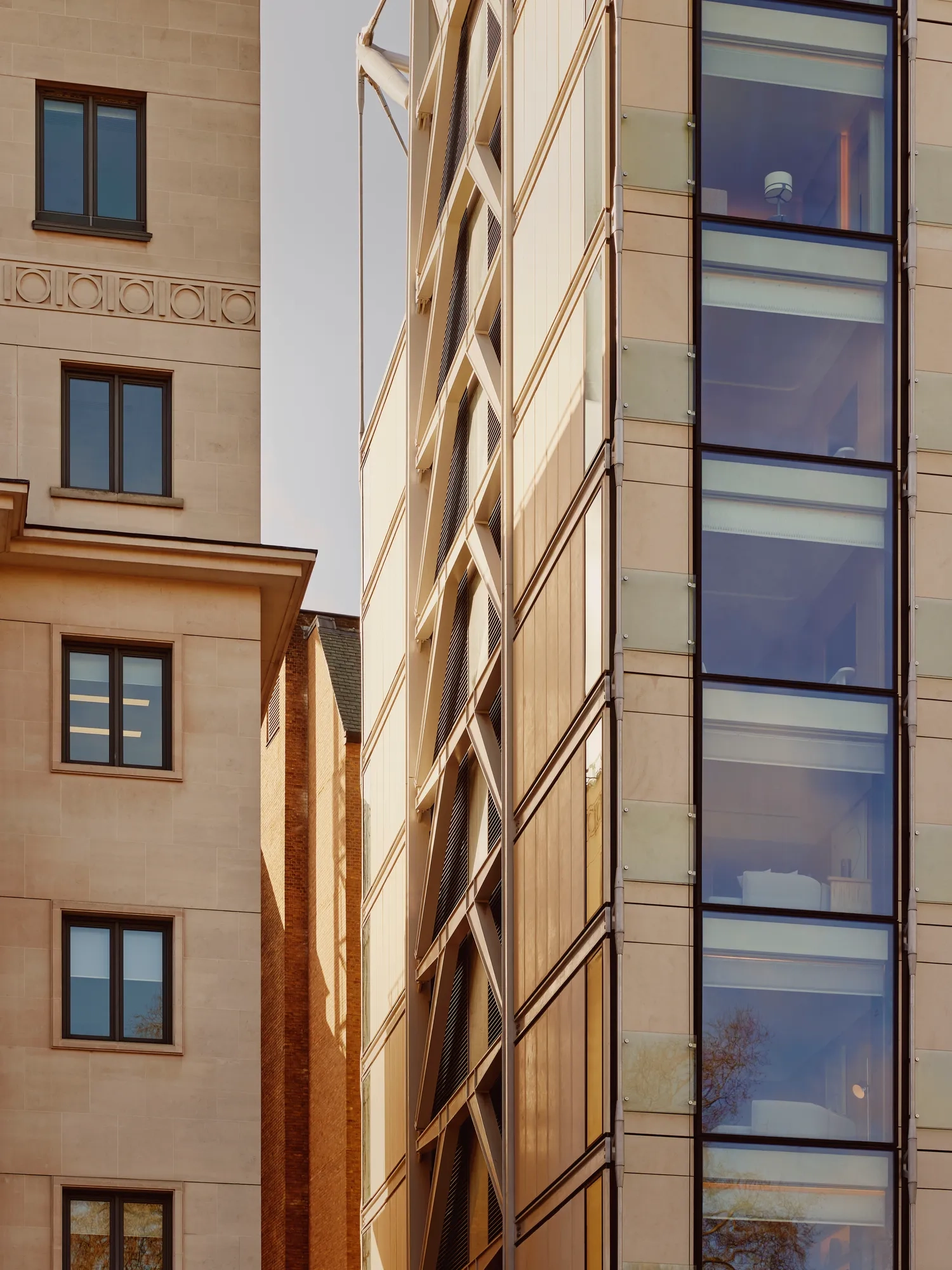 Exterior view of the Emory building with windows overlooking hotel rooms