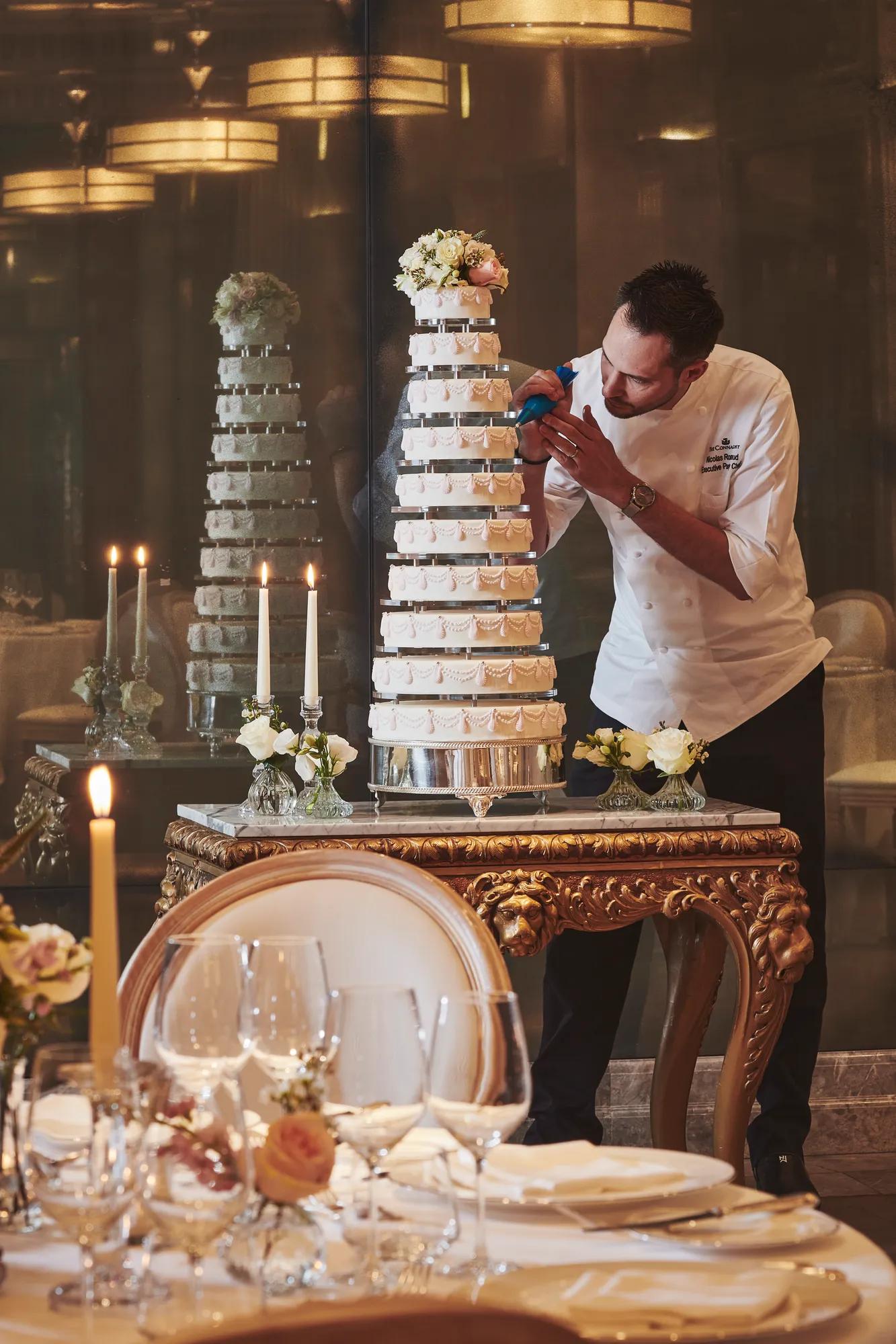 A selection of celebration cakes displayed in the Mayfair Room at Claridge’s, presented with elegant styling and refined decorative details for a special event