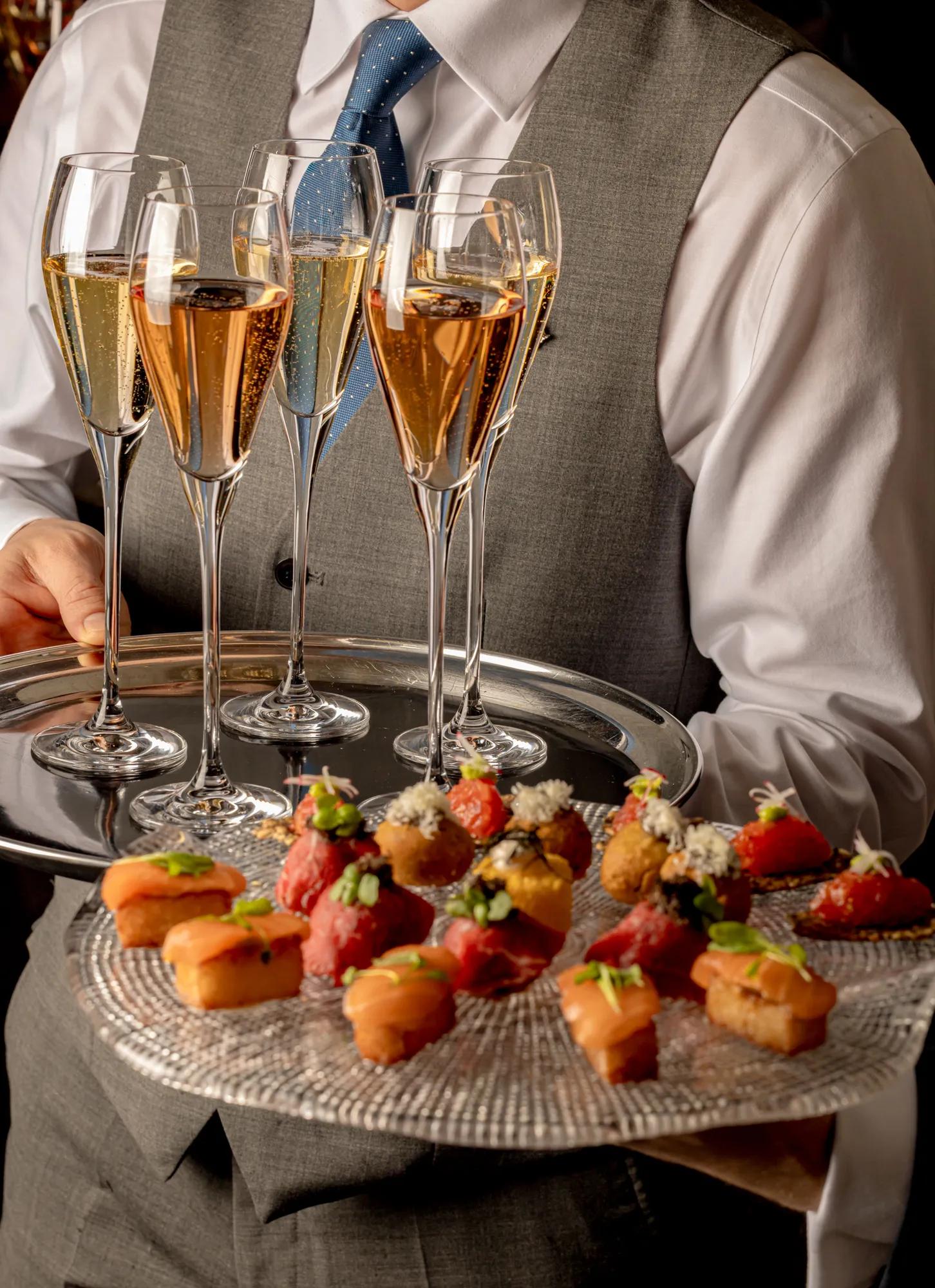 Champagne glasses and appetizers.