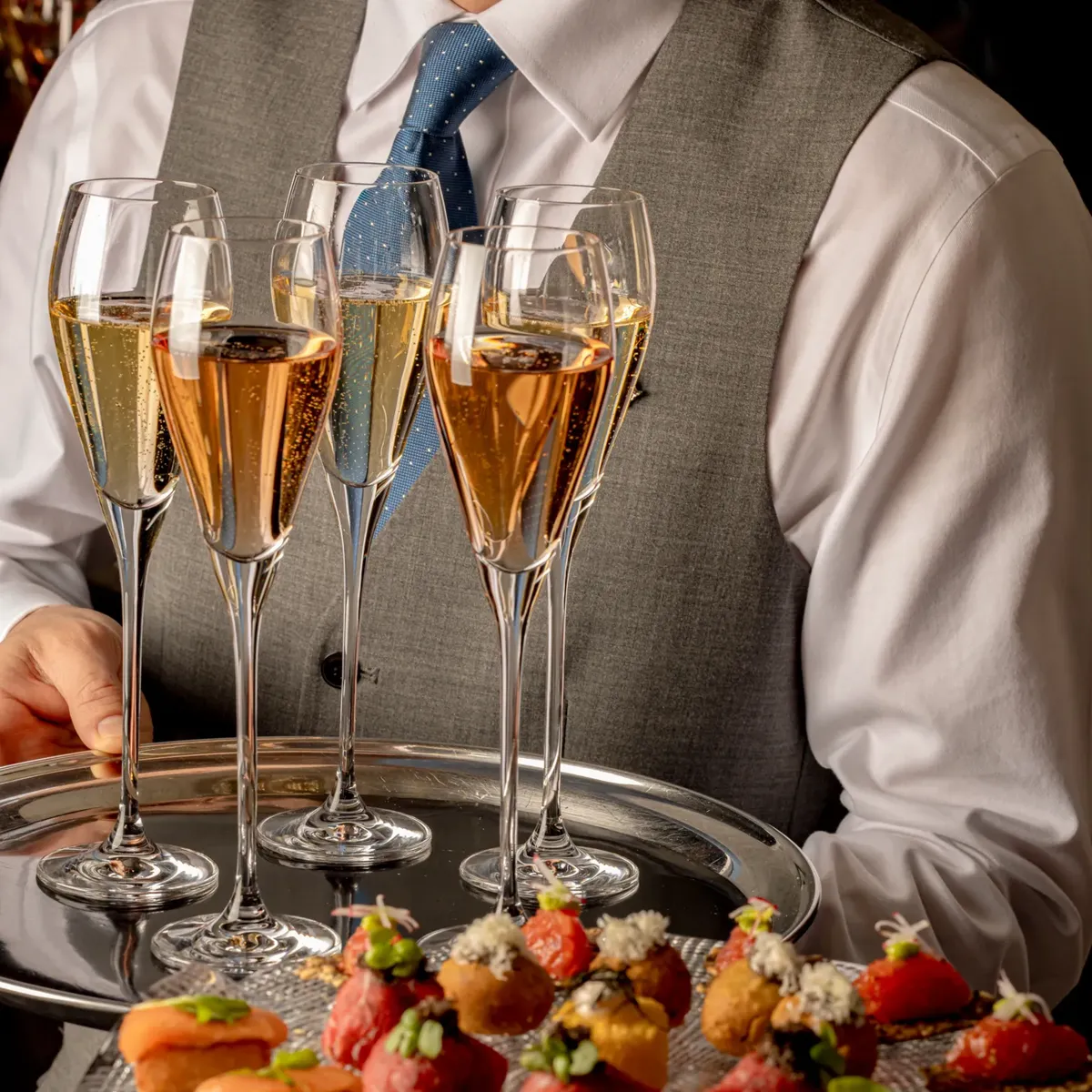 Champagne glasses and appetizers.