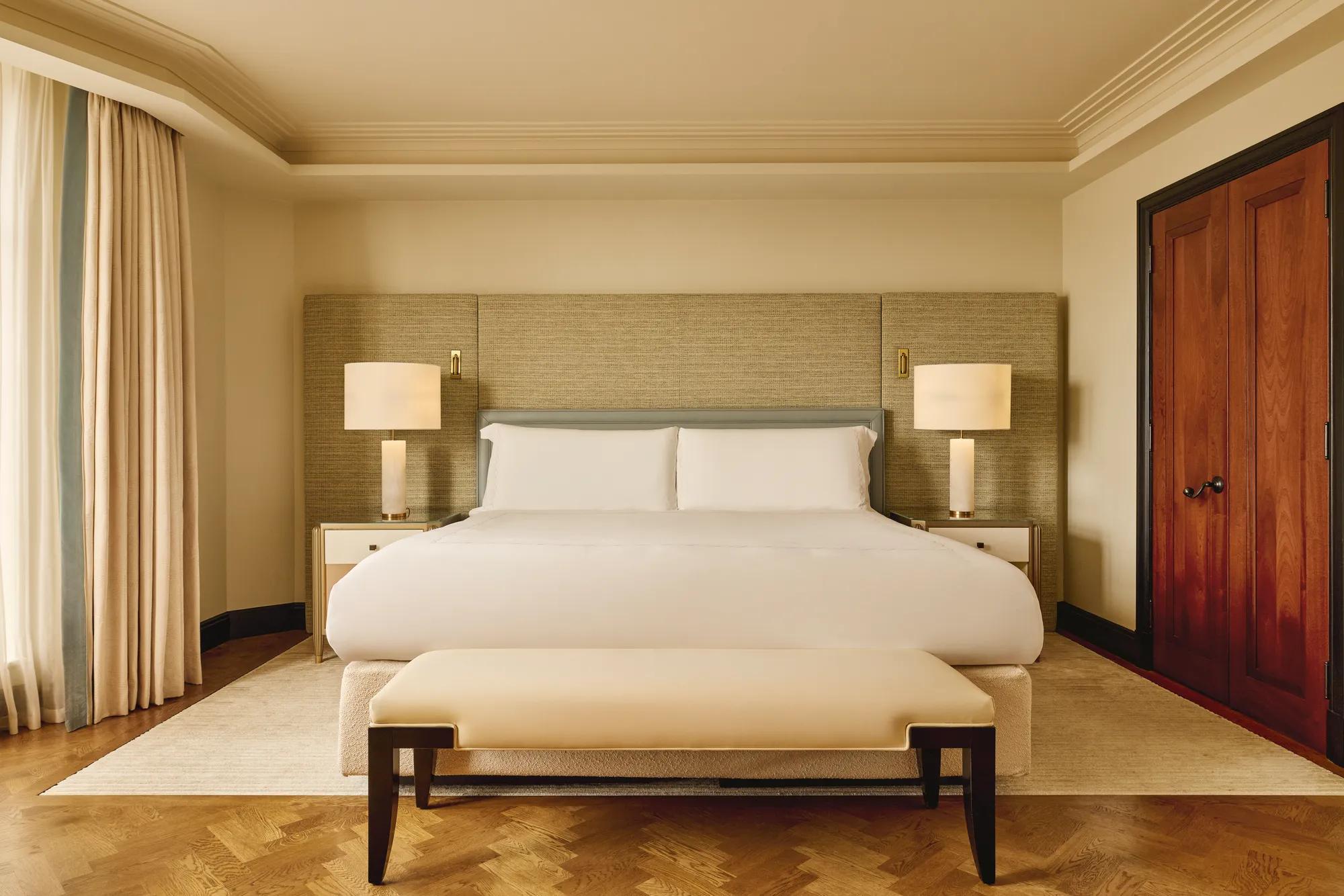 A Corner Terrace Suite at Claridge’s, featuring elegant contemporary décor and a private terrace offering elevated views across Mayfair.