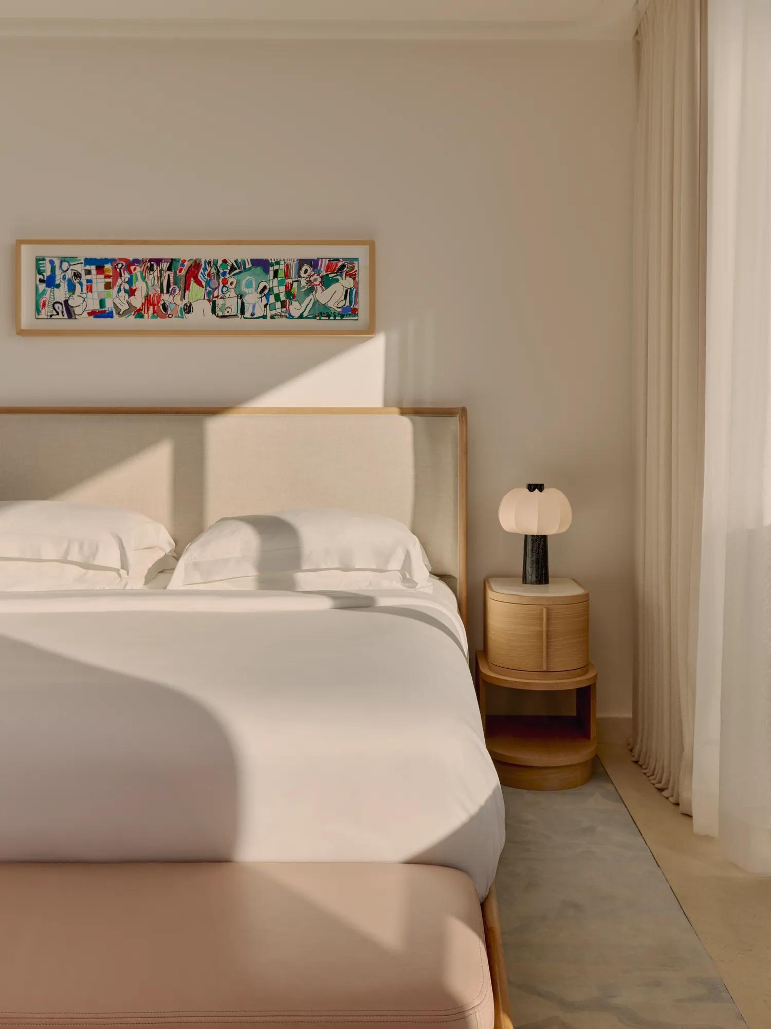 The Infinity Pool Duplex Suite at Maybourne Riviera, featuring elegant contemporary interiors and expansive views over the Mediterranean from its private terrace and pool.