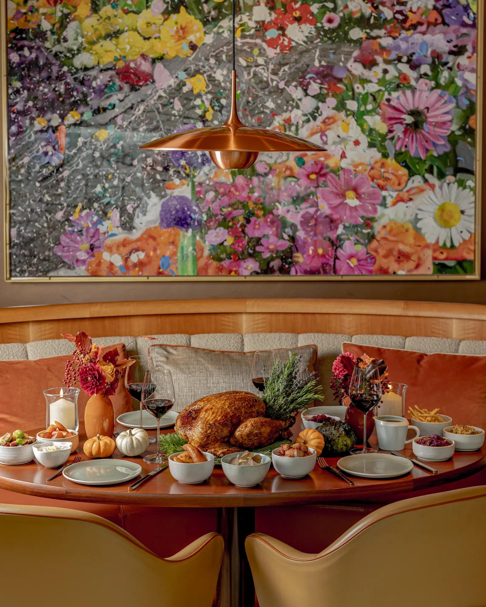 Thanksgiving table at ABC Kitchens adorned with seasonal dishes, autumn décor and a welcoming atmosphere for festive family dining.