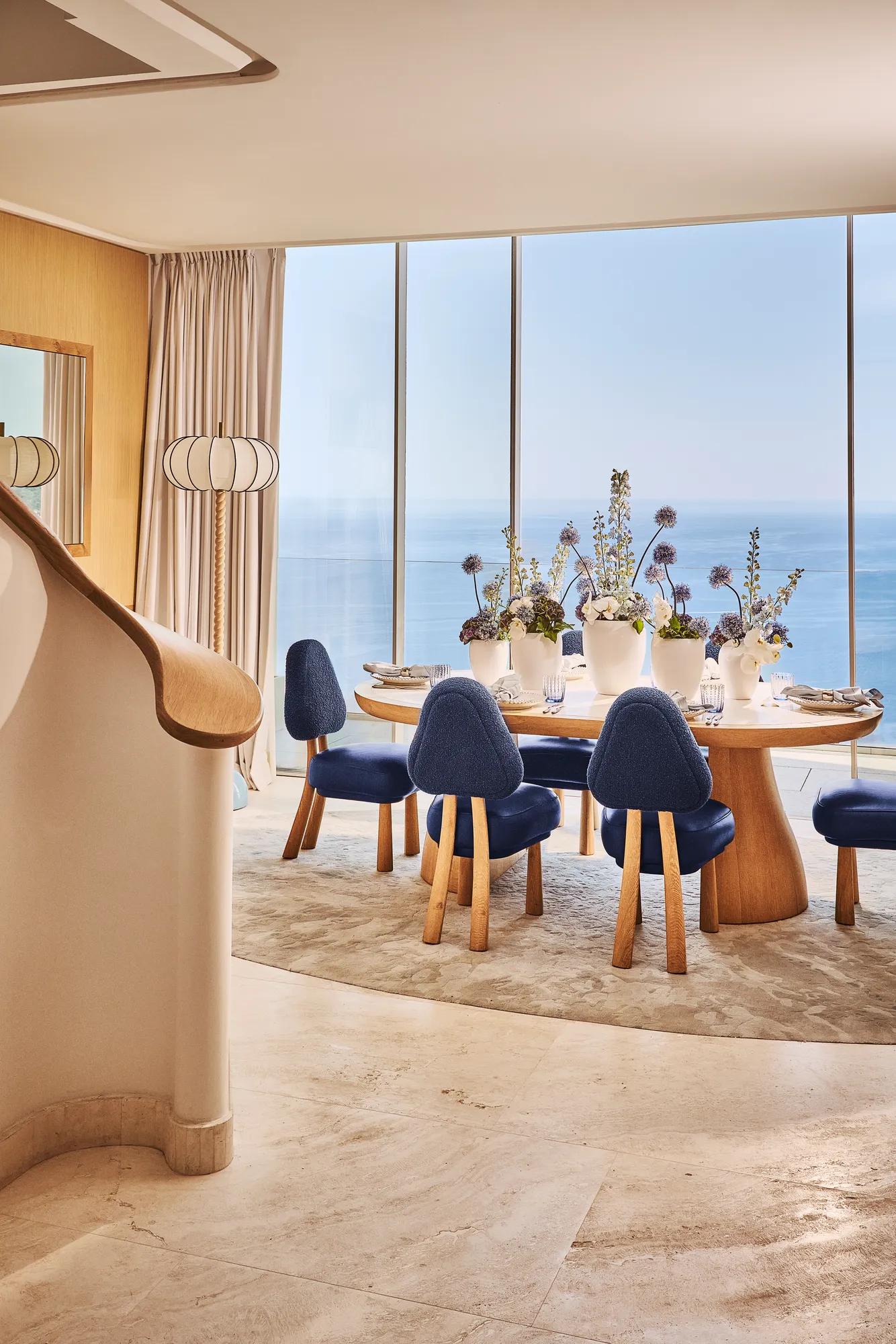 A private dining setup in a suite at Maybourne Riviera, featuring elegant table décor, soft ambient lighting, and refined details creating an intimate event atmosphere