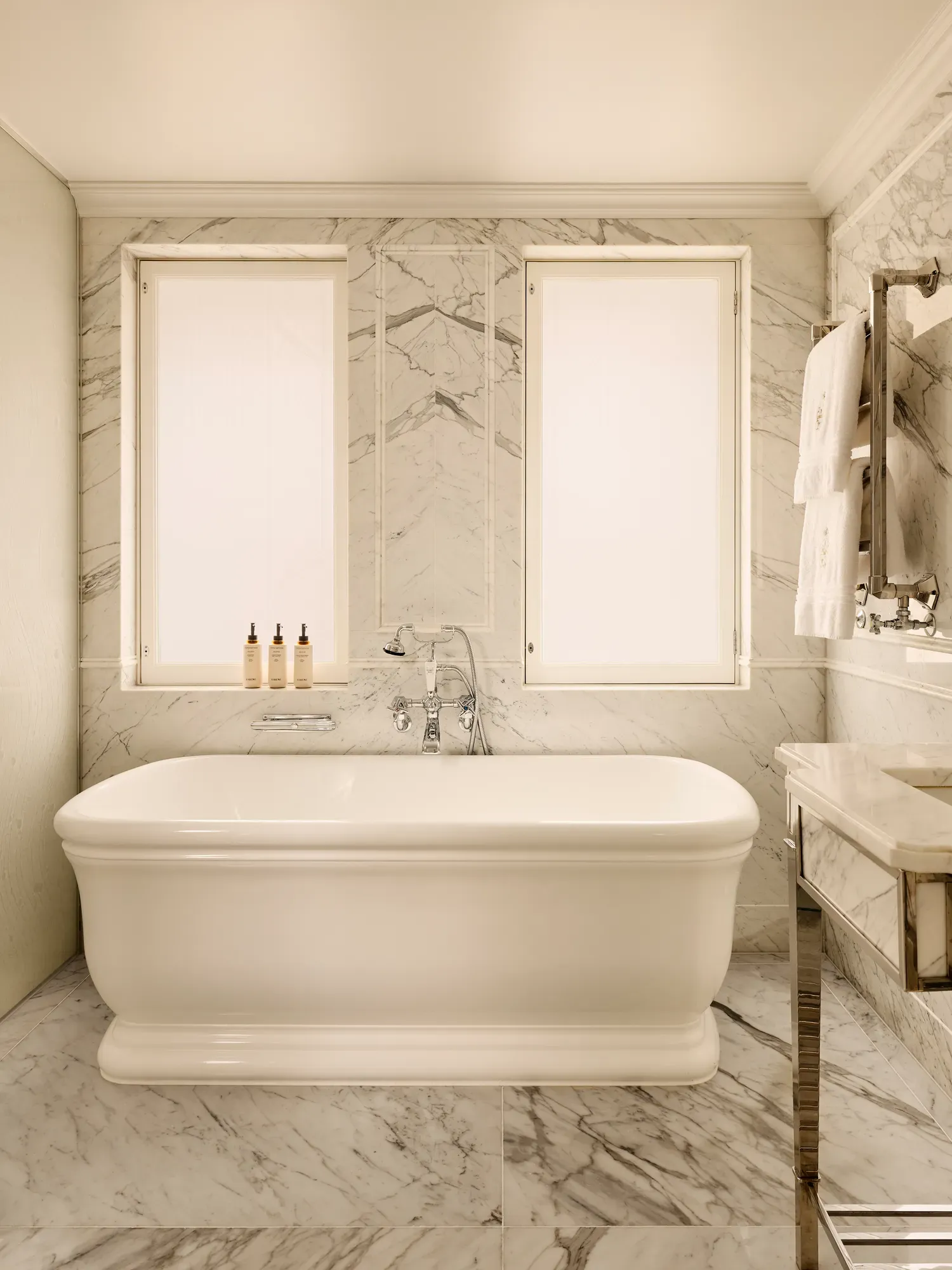 A luxurious bathroom in the Claridge’s corner suite, featuring elegant marble surfaces, polished fixtures, and a serene, spa‑like design.A luxurious bathroom in the Claridge’s corner suite, featuring elegant marble surfaces, polished fixtures, and a serene, spa‑like design.