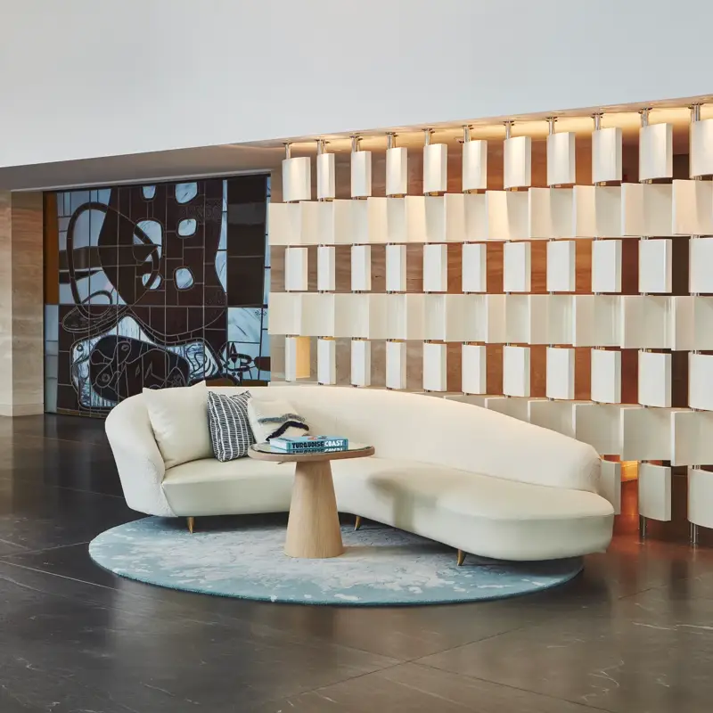 The lobby at Maybourne Riviera, featuring elegant contemporary design, refined architectural details, and soft natural light that enhances the serene Mediterranean atmosphere.