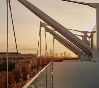 Architectural roof beams and skyline views from The Emory at dusk.