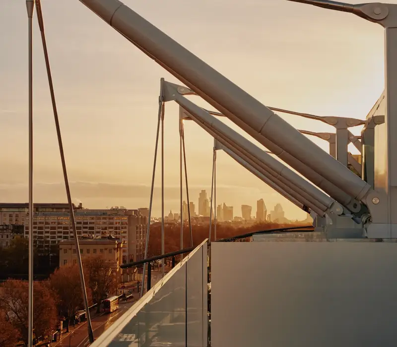 Architectural roof beams and skyline views from The Emory at dusk.
