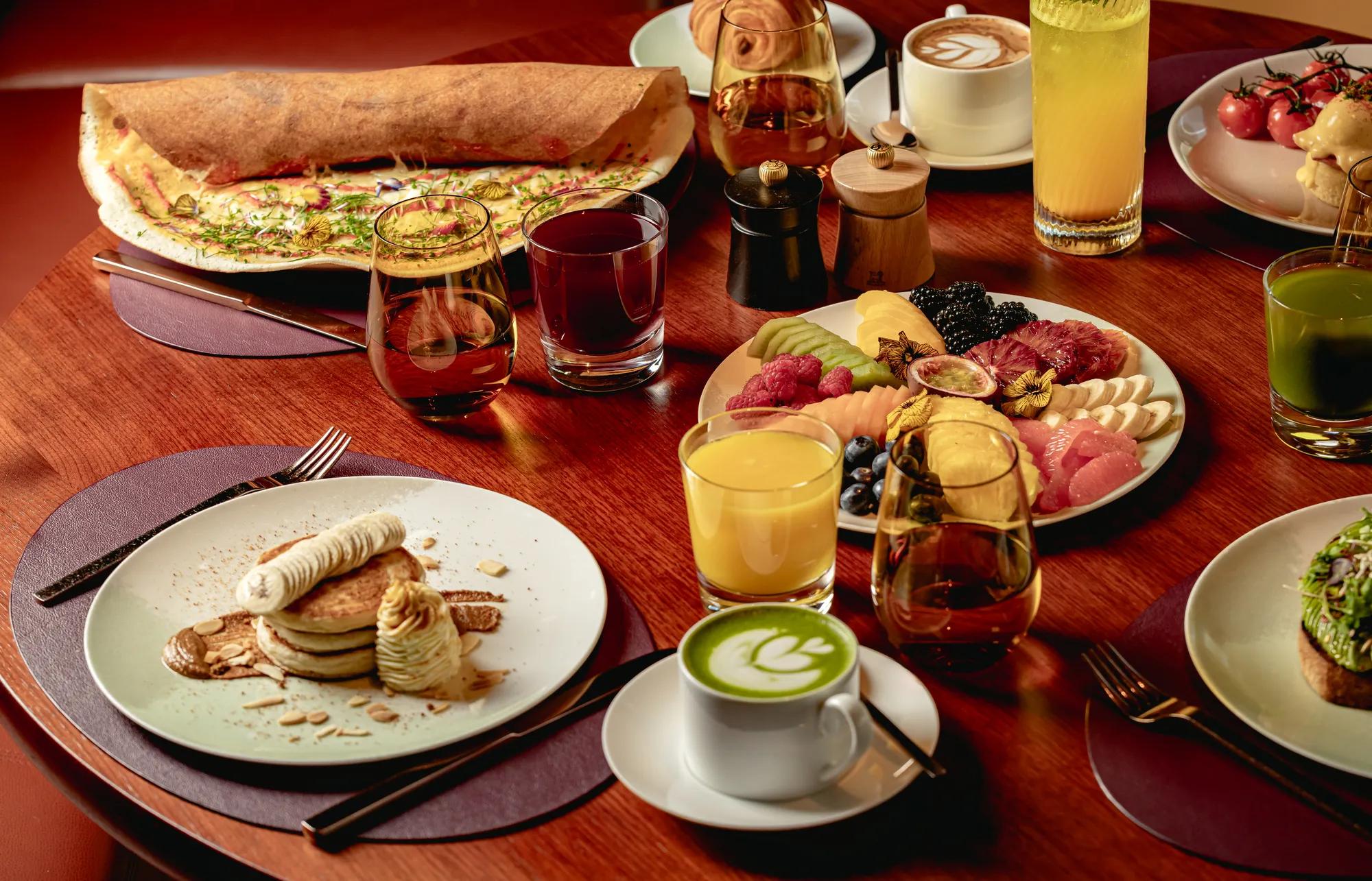 A vibrant breakfast selection at ABC Kitchens, featuring fresh dishes presented with clean, modern styling.
