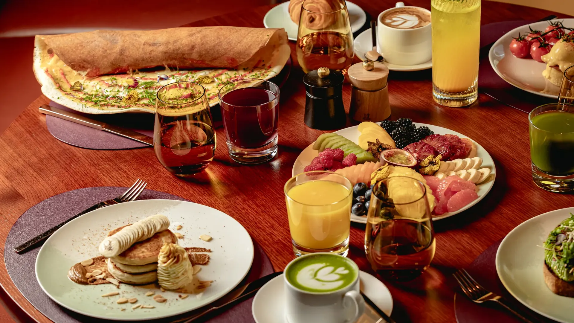 A vibrant breakfast selection at ABC Kitchens, featuring fresh dishes presented with clean, modern styling.