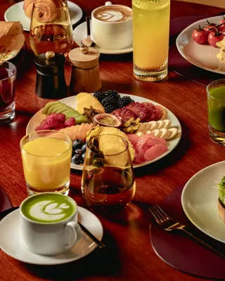 A vibrant breakfast selection at ABC Kitchens, featuring fresh dishes presented with clean, modern styling.